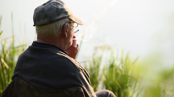 Fisherman Smoking Cigarette