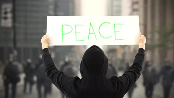 PEACE Text on a Protest Banner