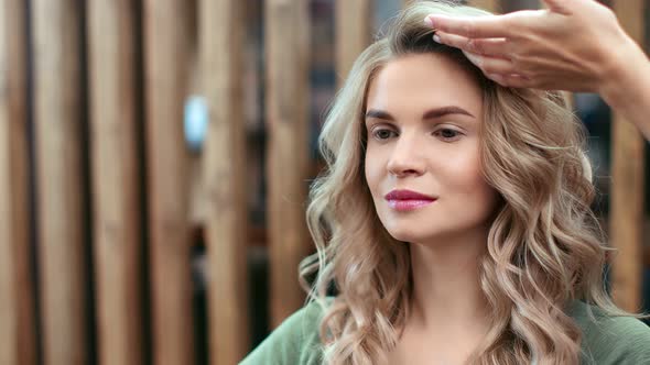 Gorgeous Woman at Fashion Salon During Creating Hairstyle