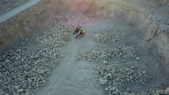 Aerial View of Opencast Mining Quarry with Lots of Machinery at Work  View From Above