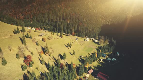 Sunny Mountainous Cottage Village Aerial View