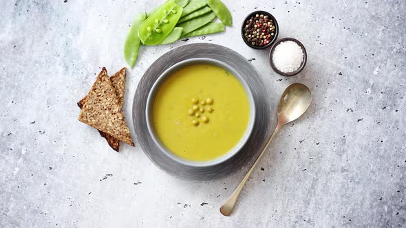 Green Pea Cream Soup in Grey Bowl