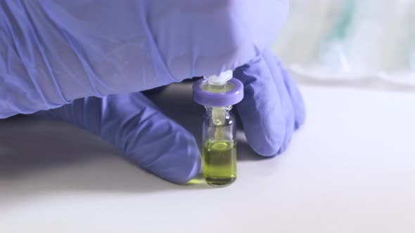 Scientist Filtering a Plant Sample Using Syringe Filter Before HPLC Analysis