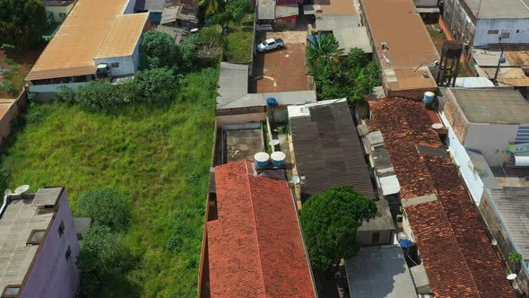 Birds eye aerial shot flying over impoverished neighborhood in Altamira, Brazil