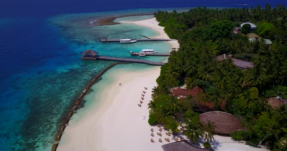 Daytime aerial abstract view of a sunshine white sandy paradise beach and turquoise sea background i