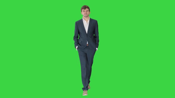 Handsome Business Man Walking Forward on a Green Screen, Chroma Key