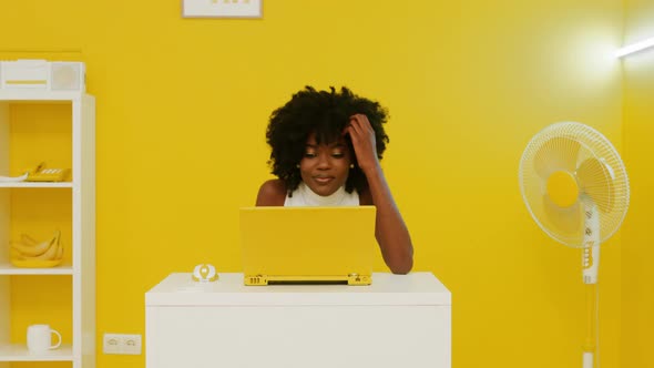 Woman Is Getting Surprised While Working at Laptop