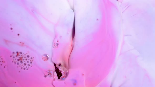 Slow Motion of Bright Colored Bubbles. alt