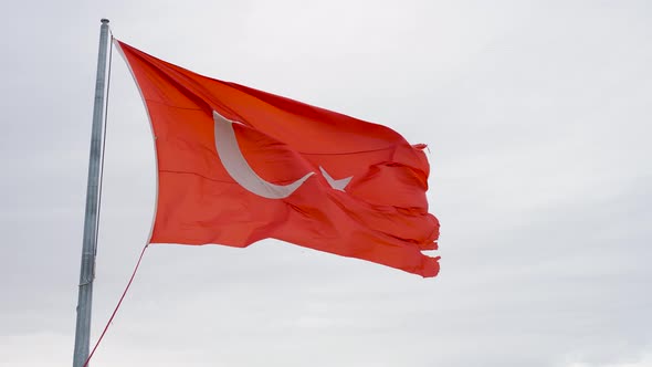 Big Red Slightly Shabby Turkish Flag Fluttering in the Wind