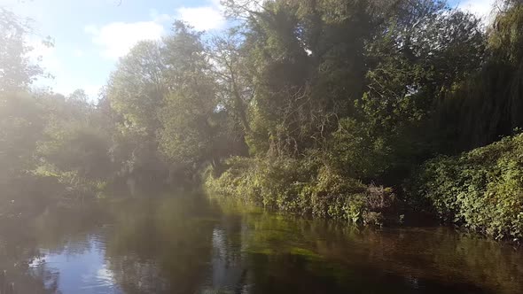 The River Stour in Canterbury, Kent in Autumn.  A river shot with autumn colours surround it.