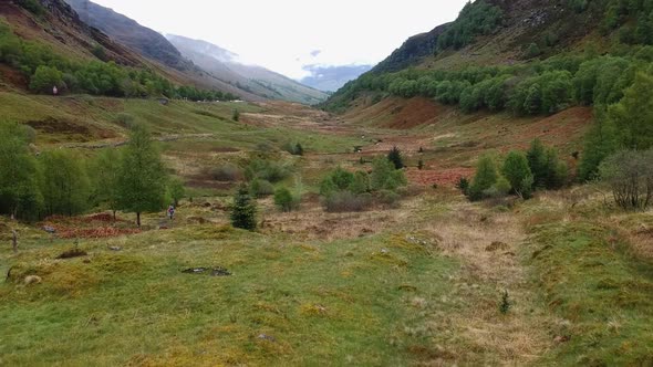 Cinematic drone shot of scottish highland valley