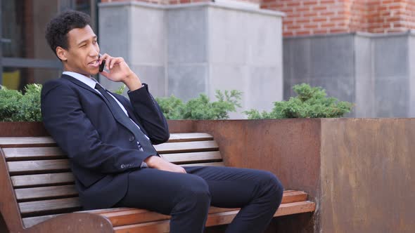 African Businessman Talking on Phone