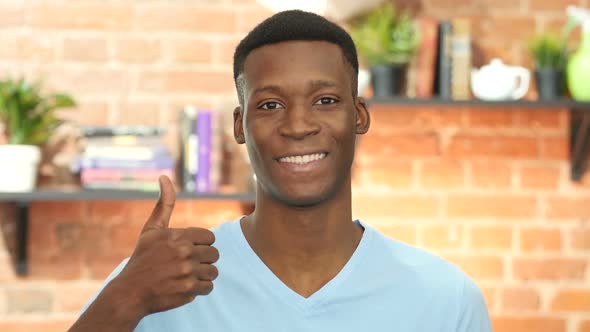 Thumbs Up By Black Young Man