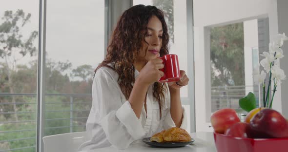 Woman Drinking Her Morning Coffee