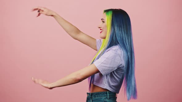 Young Woman Going Back with Waving Hands Pointing Fingers to Camera and Smiling and Keep Moving Free