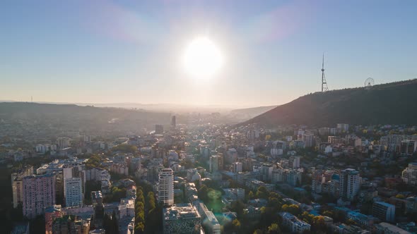Aerial hyperlapse of beautiful cityscape of Tbilisi at sunrise, Georgia 2021