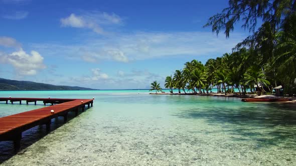 Wooden Pier on Tropical Beach in French Polynesia