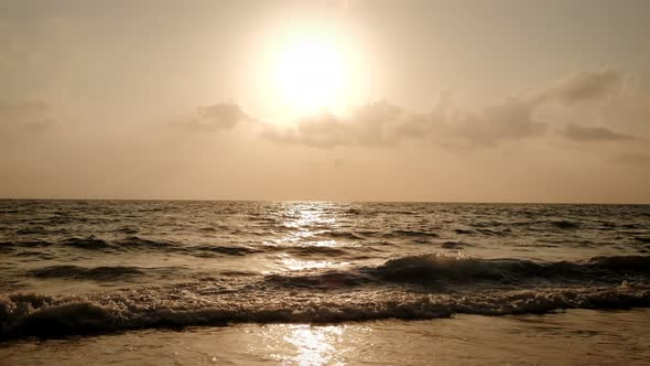 Wide Shot of Golden Sea Sunrise