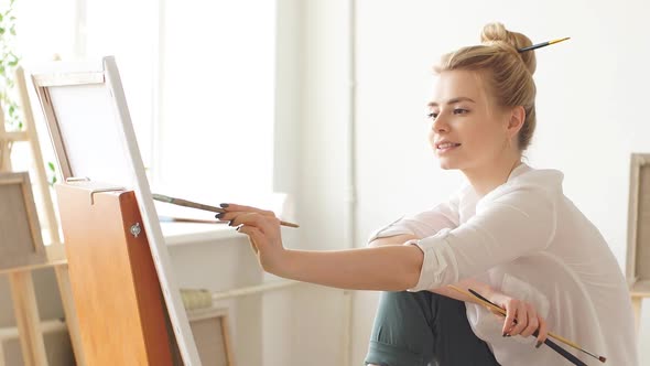 Woman Expressing Her Thoughts and Feeling Through Painting