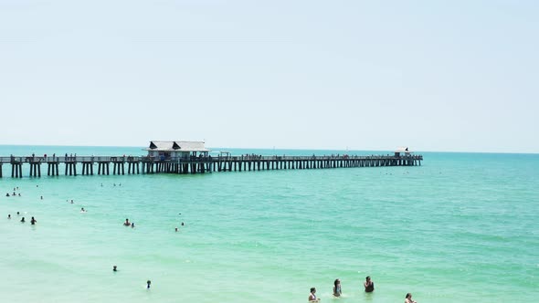 Aerial Drone View of Pier in the Ocean in Suny Day