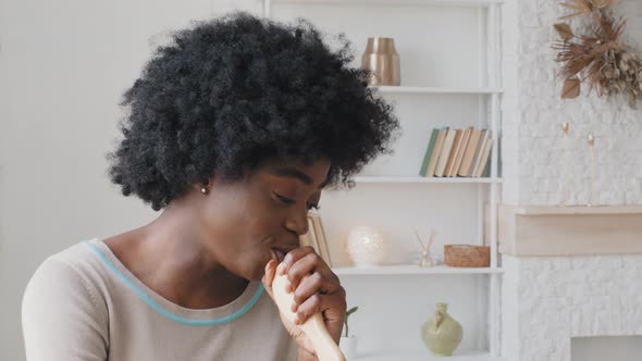 Headshot Carefree Young Adult Millennial African American Girl Relaxing at Home Enjoying Weekend