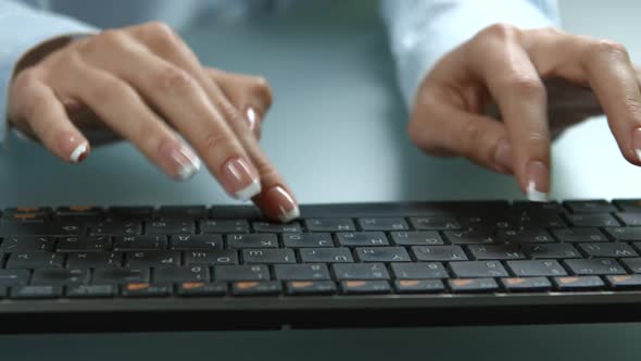 Girl Is Typing on the Keyboard.