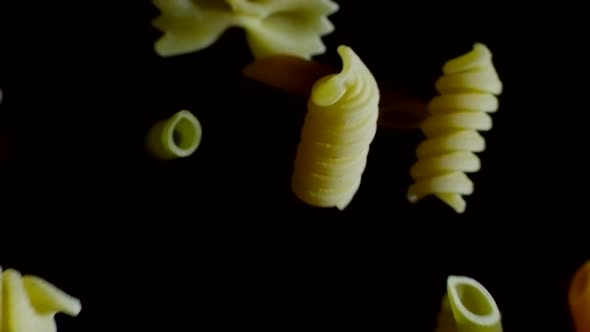 Raw Pasta on Dark Background