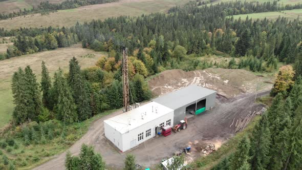 Small waste recovery burning plant in mountains.