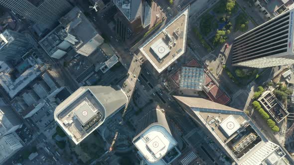 AERIAL: Helicopter Passing Slow Lowering and Circling Birds Eye View Over Downtown Los Angeles