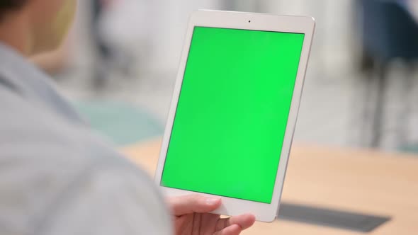 Man Using Tablet with Green Chroma Key Screen Close Up