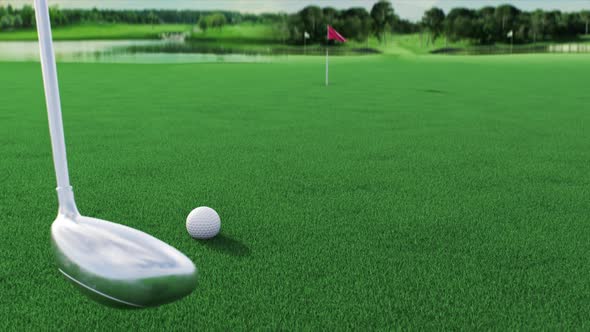 a Golf Ball Rolls Across the Course Into a Hole After Being Hit By a Golf Club