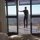Man Standing on Terrace Patio Enjoying the View at Fish River Canyon in Namibia - VideoHive Item for Sale