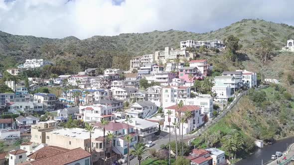 Flying towards incredible houses on hill on Catalina island