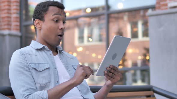 Wow, African Man Using Tablet in shock