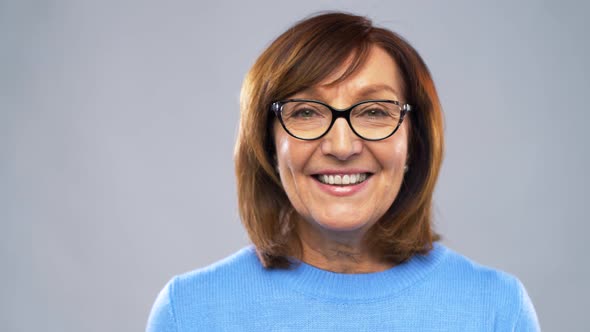 Portrait of Happy Senior Woman in Glasses 3