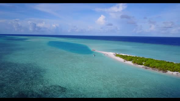 Aerial view panorama of exotic bay beach voyage by blue green ocean and white sand background of jou