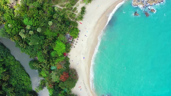 Aerial tourism of tranquil seashore beach vacation by turquoise ocean and white sandy background of 