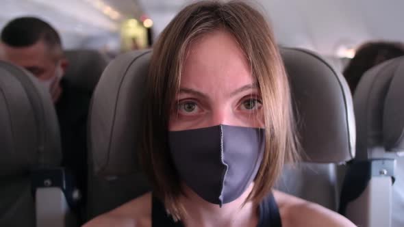 Masked Woman on the Plane