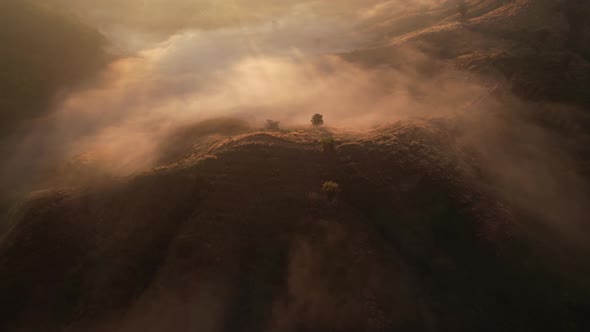 4K Drone Flying through the clouds at dusk or dawn. Aerial top cloudscape