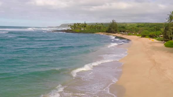 Aerial view of the beach and ocean in Hawaii