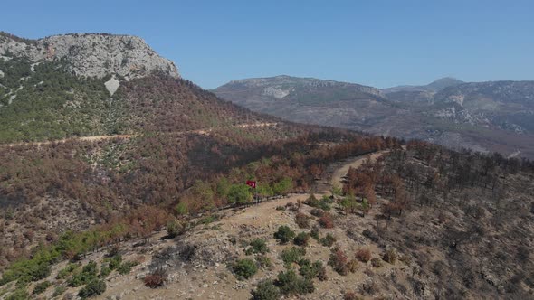 Turkish Flag at Rugged Mountain