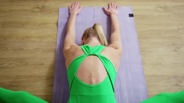 Woman Stretching in Living Room High Angle View Slow Motion