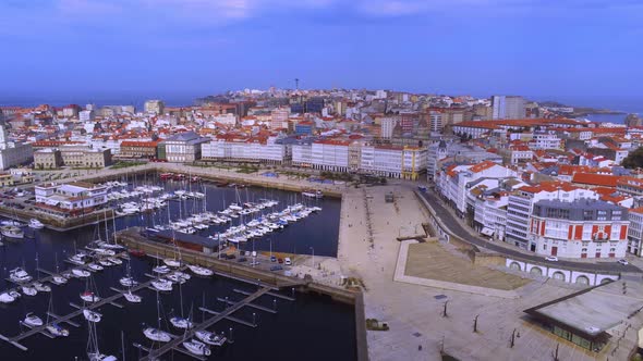 Port of coastal city in evening