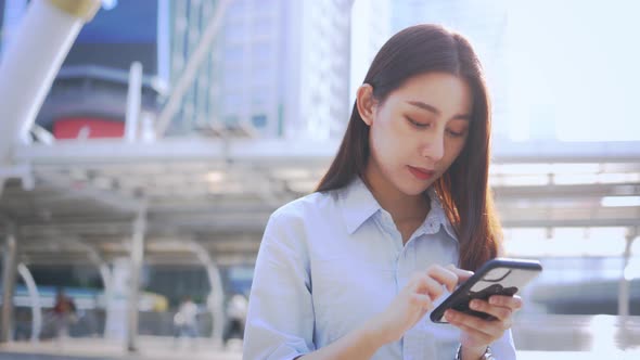 Young Businesswoman Using Smartphone