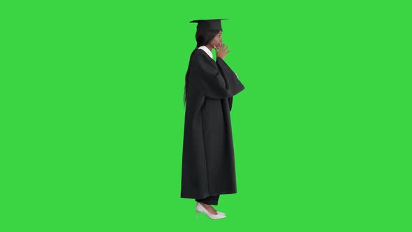 African American Female Graduate Holding Diploma and Giving Speech on a Green Screen Chroma Key