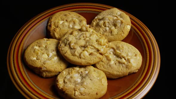 Cinematic, Rotating Shot of Cookies on a Plate 