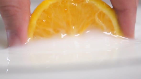 Pulling Orange From the Milk