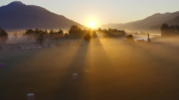 Drone Over Ethereal Misty Landscape Of Zell Am See In Morning