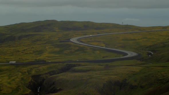 beautiful iceland landscape during sunset, ring road 1, the main higway with passing cars can be see