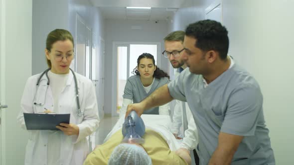 Paramedics Moving Patient to Emergency Room